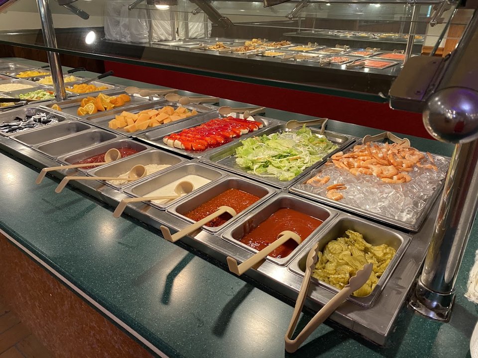 Counter with trays and serving spoons
